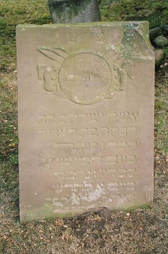 flat gravestone with Hebrew inscription