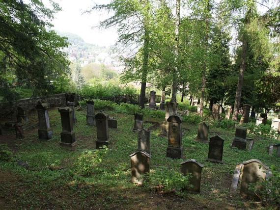 View down the hill to individual gravestones