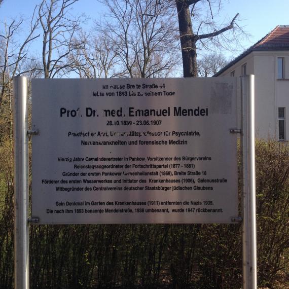 The text lists the offices Mendel held and states that the monument in the hospital garden was removed by the Nazis in 1935.