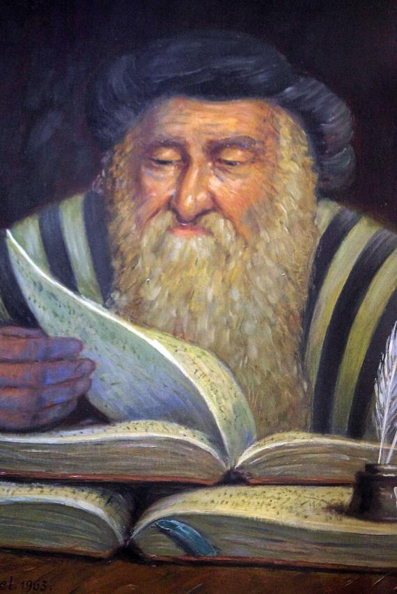 The painting shows the aged Rashi with long white beard. He wears a blue headdress and reads in a book.