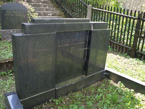 large tombstone composed of black marble