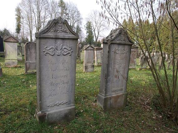 two gray gravestones