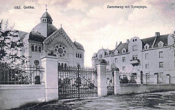 high, decorated gable, in it a large round window with several small ones around it