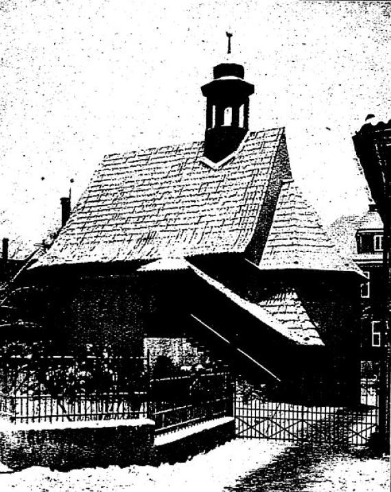 Photograph of St. Nicholas Chapel with tower in the time as a synagogue in black and white