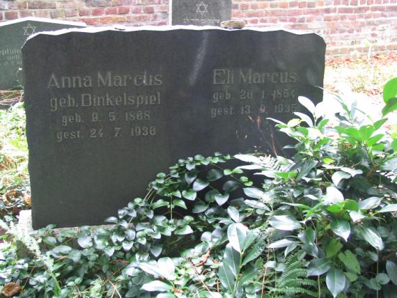 Double dark tombstone with gilded inscription of Eli Marcus and his wife Anna