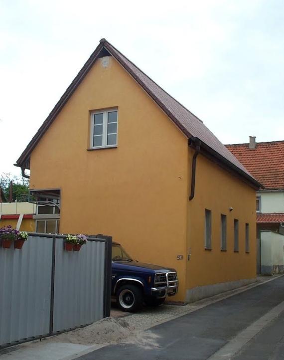 orange painted two-storey residential house