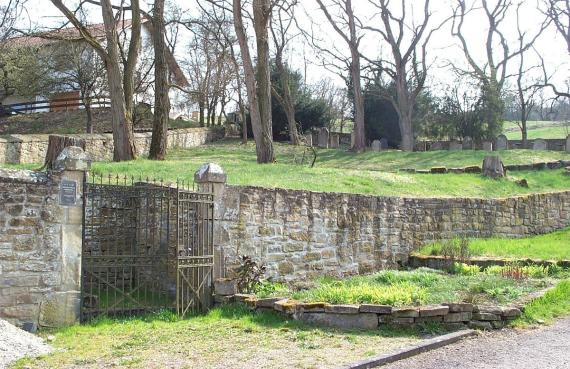 Steel gate in a wall, higher cemetery