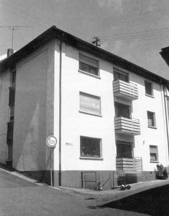 Residential house with three floors and balconies