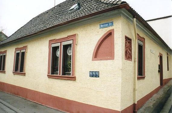 one-storey, yellow plastered residential house