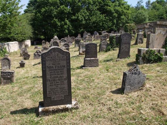 several weathered gravestones