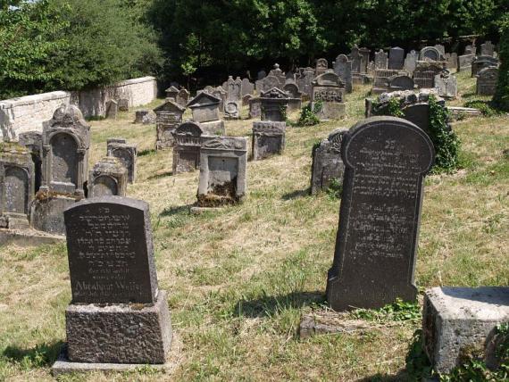 several weathered gravestones