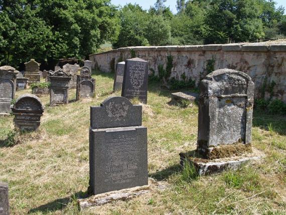 several weathered gravestones