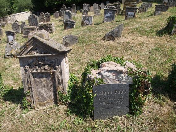 several weathered gravestones