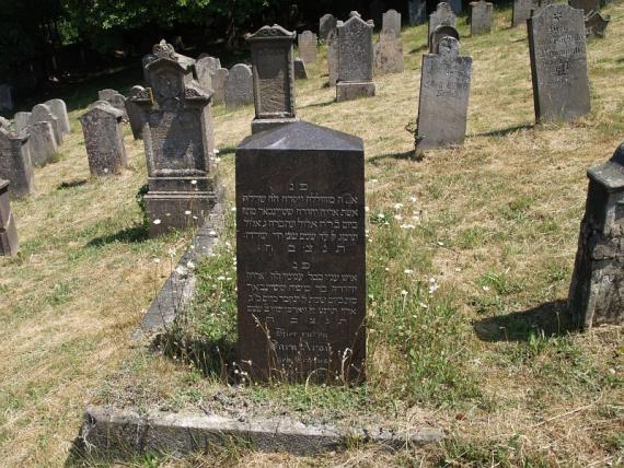 several weathered gravestones