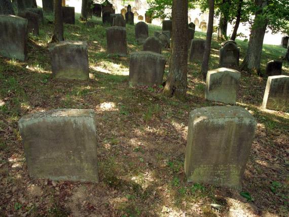 several weathered gravestones