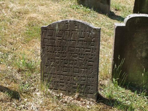 several weathered gravestones