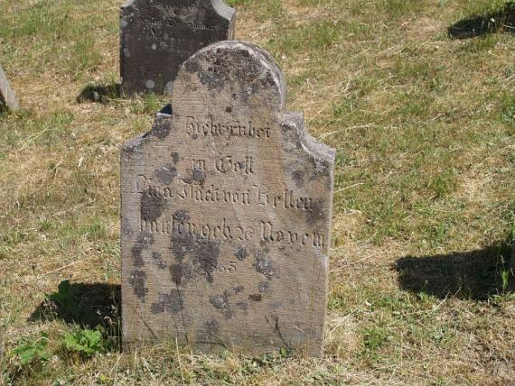 several weathered gravestones