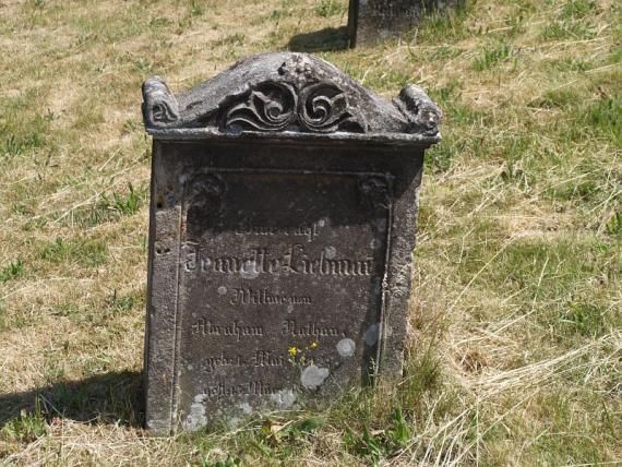 several weathered gravestones