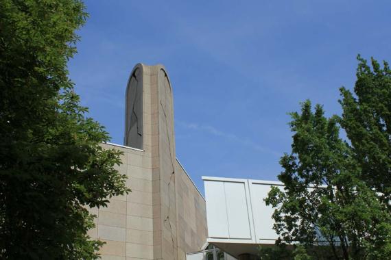 Partial view of a building with a small tower