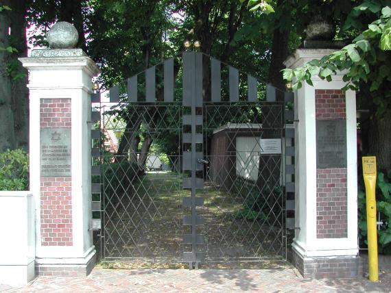 Entrance gate to the Jewish cemetery in Emden. The gate has two Stars of David and on the sides of the gate two memorial plaque in memory of the Jewish fellow citizens of Emden