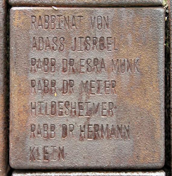 High memorial plaque with inscription in English, German and Hebrew in memory of the community and its school and synagogue, which were destroyed during the Nazi period.