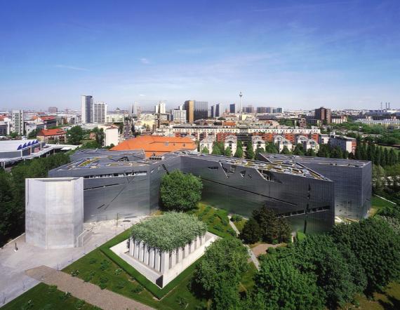 Aerial view of the Jewish Museum with a view of the zigzag-shaped Libeskind Building with Garden of Exile. On the horizon the Berlin television tower