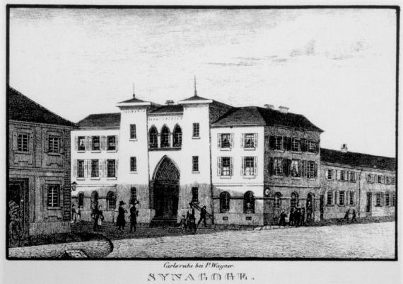 Black and white image, large forecourt, in the background a large building