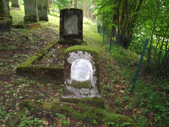 Photography of child gravestone, bright center draws attention to it