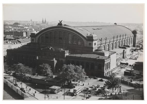 View over the Anhalter station in Berlin. Black and white picture of the terminus station with many windows and a clock on the entrance gate