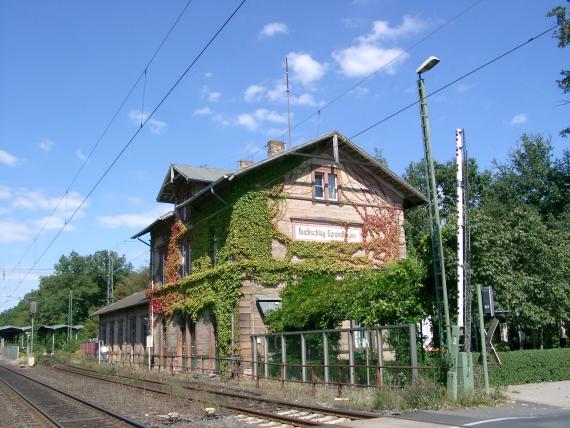 Dreieich train station, brick building overgrown with ivy