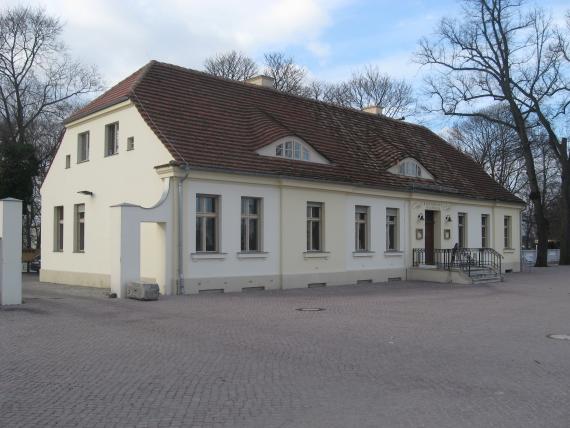 Big wide house with red roof