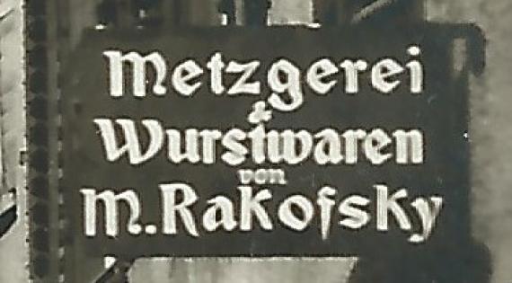 Historische Ansichtskarte Nördlingen - Löpsingerstraße mit Metzgerei M. Rakofsky, versandt 16. Juli 1932  - Ausschnittvergrößerung Metzgereischild