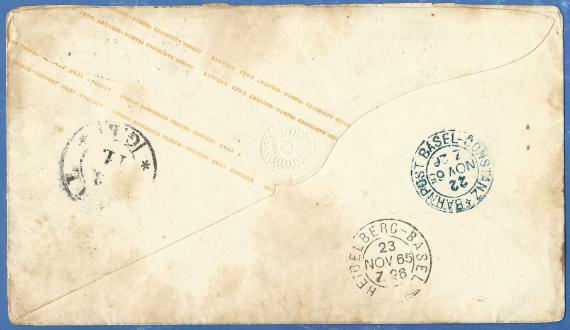 Briefumschlag - Bezirks & Conferenz Rabbiner Briefumschlag an Hochwürden Herrn Bezirks & Conferenz Rabbiner L. Schott, - versandt am 22. November 1865 - Briefumschlagrückseite mit verschiedenen Bahnpoststempeln - Bahnpost Basel - Constanz - 22. Nov. 65 - Zug 26 und Bahnpost Heidelberg - Basel 23. Nov. 65 - Zug 26
