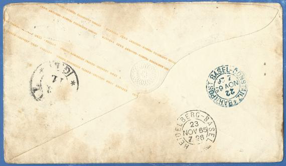 Envelope addressed to Reverend Mr. District & Conference Rabbi L. Schott, - mailed Nov. 22, 1865 - back of envelope with various railroad postmarks - railroad post Basel - Constanz - Nov. 22, 65 - train 26 and railroad post Heidelberg - Basel Nov. 23, 65 - train 26.