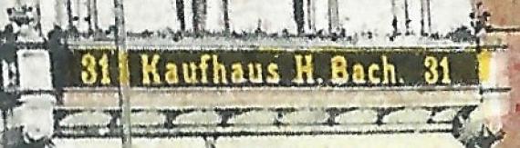 Historische Ansichtskarte vom Markt in Mittweida - Geschäftshäuser am Markt mit dem Kaufhaus H. Bach - aus der Zeit um 1910 - 1915 - Ausschnittvergrößerung Namenszug über dem Geschäft