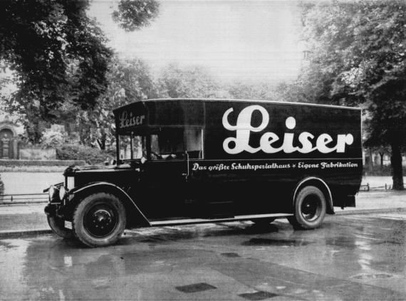 Black and white photograph of former company vehicle of trading company Leiser