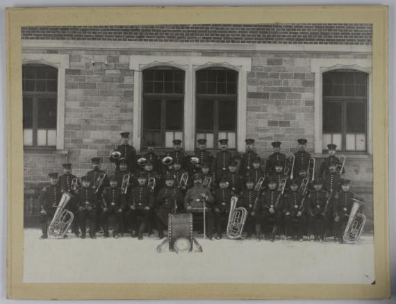 Black and white picture: Group shot with Herbert Tannenbaum as military musician