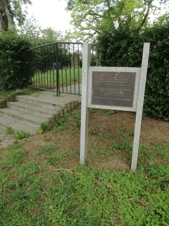 Entrance gate with sign on the right side