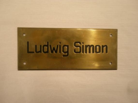 Rectangular copper colored nameplate