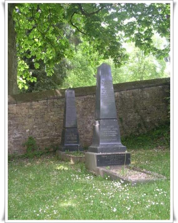 View of two stelae in front of the inner cemetery wall