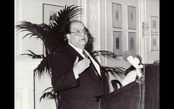 R'Louis Fisher giving a keynote address