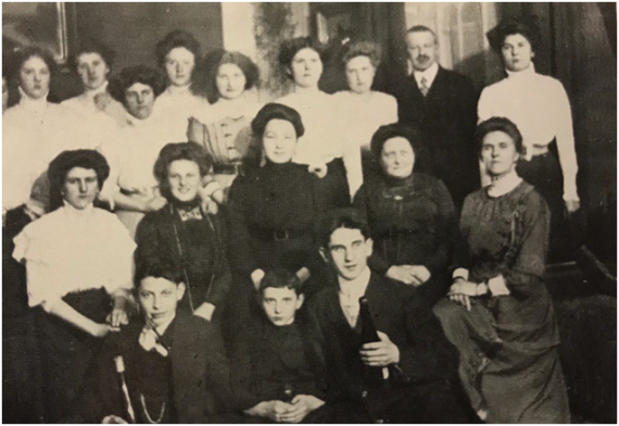 Black and white group photo of the staff of the Hermann Wallheimer company