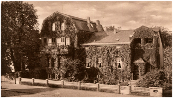 Sepia photograph of the converted overgrown Ballin's villa