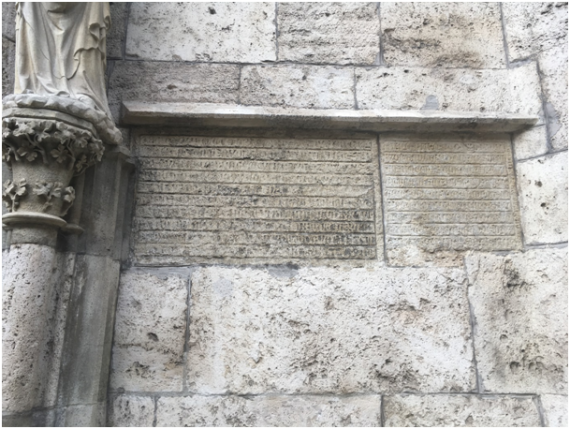 The "Stone Chronicle" on the north portal of St. Mary's Church contains early records of the Jewish history of the city