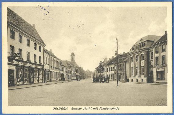 Picture postcard from Geldern - Großer Markt with peace lime tree - with textile store Albert David, - sent as field post on September 23, 1915