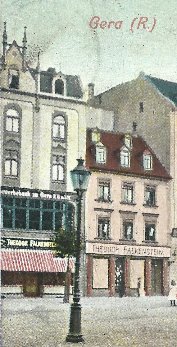 Alte Ansichtskarte Gera - Johannisplatz mit Postdemus-Denkmal und dem Geschäft von Theodor Falkenstein, versandt am 18.August 1911 nach St Louis - USA  - Ausschnittvergößerung - Geschäft von Theodor Falkenstein