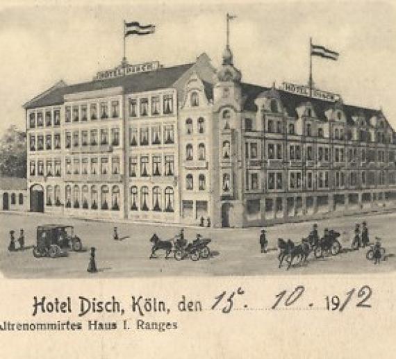 Old drawing of a large building. In front of the building are people and carriages.