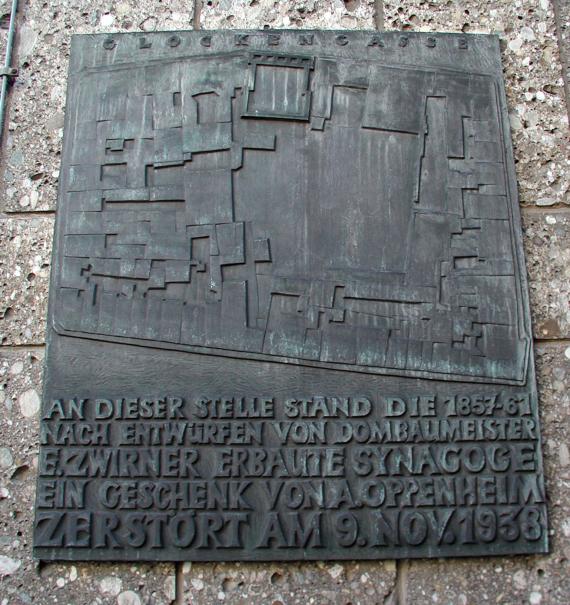 Metal plate with inscription and city map.