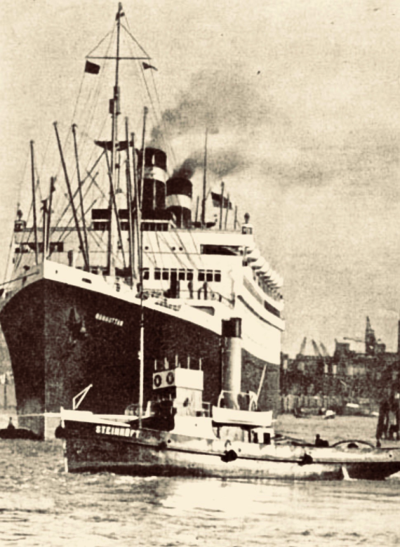 Old photo of a very large ship at the port.