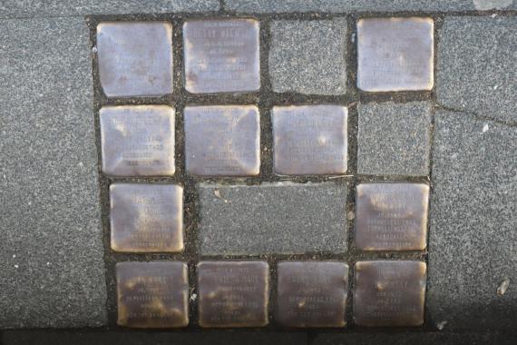 Twelve stumbling blocks on the ground.